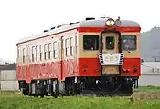 KiHa 52 125 in May 2011 after repainting into original JNR two-tone vermillion & beige livery