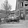 Children bring soldiers of the Irish Guards apples, 18-09-1944. In recognition of the courage, friendship and the sympathy which the population gave to the veterans of the U.S. 101st Airborne Division, the monument to thank the Dutch was founded exactly fifty years after Market Garden in Sint-Oedenrode.