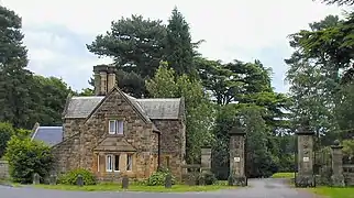 Kingston Hall lodge with attached gateway (Grade II).