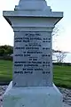 Inscription on one of the four sides of the memorial