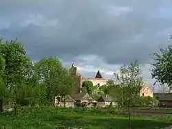 Panorama of Kysylyn with ruins of Catholic church in the background