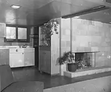 The kitchen and cinderblock fireplace, 1952