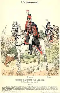 Two Prussian Hussars from 1792 wear the Flügelmütze, one with the death's head emblem.