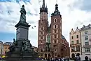 Adam Mickiewicz Monument in front of the basilica