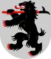Arms of Kontiolahti featuring a bear (kontio in Finnish), carrying a log driving pike pole referring to the importance of forestry in the region's economy.