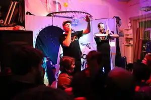 Koo Koo performing in 2012.From left to right: Bryan and Neil