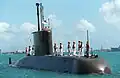 Sailors on board the Korean submarine Lee Chun stand at the ready, as they prepare to go pier-side in Apra Harbor, Guam. The Koreans are joining by other allied forces in Guam to participate in Exercise TANDEM THRUST '99.