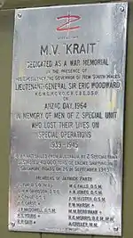 The plaque affixed to the wheelhouse in 1964 dedicating Krait as a war memorial
