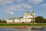 Church at Skałka and water taxis on the Vistula.