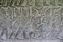 Angkor Wat, 16th century AD, showing a musician playing a kse diev.