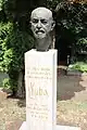 Bust and gravestone in the cemetery in Poděbrady.