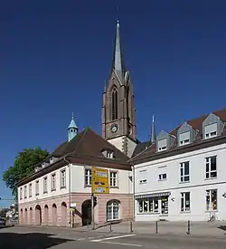 Old town hall in front of the church of St. Sebastian