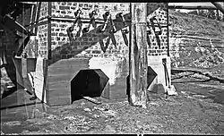 Kurth Kiln during construction showing charcoal extraction chutes and water cooling pipes. Circa late 1941. Source: FCRPA collection.