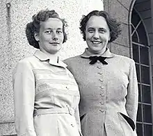 Photo of two women standing outside
