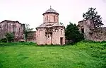 Church and fortified walls.