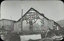 Kwakwaka'wakw house decorated with three designs, Fort Rupert, 1885