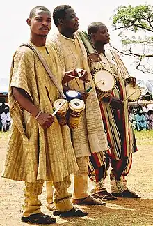 Yoruba men in folk costume in Nigeria