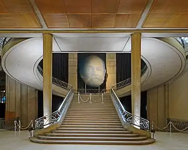 Stairway of the Economic and Social Council in Paris, originally the Museum of Public Works, built for the 1937 Paris International Exposition, by Auguste Perret (1937)