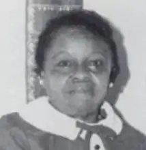 a somewhat grainy black and white headshot of a middle-aged black woman with short hair