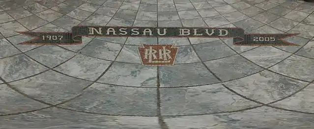 Tilework on the floor of the station house.