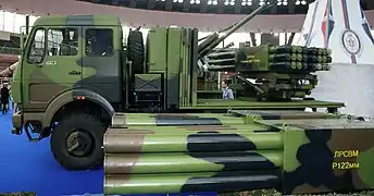New Serbian Modular multiple rocket launcher (LRSVM) which can fire various rockets as 128mm Oganj (mounted on truck on picture), 122mm Grad (container in front of truck on picture) and 128mm Plamen. System is mounted on new FAP 1118 truck. "Partner 2011" military fair.