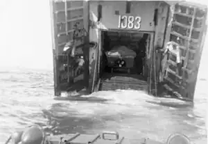 USMC DUKW entering LST-1083 USS Plumas County during maneuvers near Oakland, California