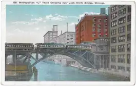 A Metropolitan West Side Elevated Railroad "L" train passing over the Chicago River in 1918