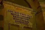 Inscription on the right side of the Laferla Cross shrine.