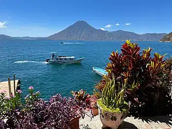 View of a lancha and Volcán Atitlán from Hotel La Casa del Mundo