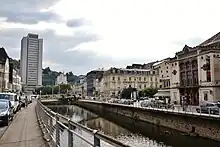 La Corrèze river in Tulle: Theater to the right