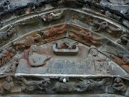 The tympanum over the south porch entrance depicting the nativity.