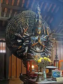 Avalokiteśvara of One Thousand Arms, lacquered and gilded wood. Restored in 1656 CE. Bút Tháp Temple, Bắc Ninh Province, Vietnam