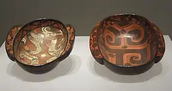 Lacquered "eared" or flanged cup (耳杯) with cloud designs from Warring States.