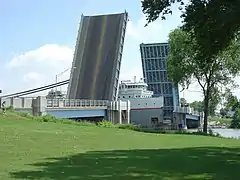 The drawbridge with a freighter passing underneath