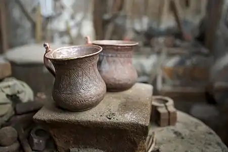 Buta on copper items in Lahij