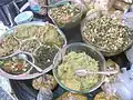 Tasters at a lahpet stall in Mandalay