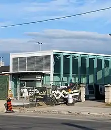 Photo of a glass panelled subway station entrance