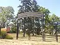 The entrance to the cemetery for the hospital, located on Evans Ave.