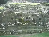 Temple of the Jaguar Masks - detail of what is believed to be a jaguar head, left-hand side of temple (when facing its front).