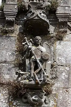 Saint Michael fighting the dragon by Bastien Prigent. The elaborate console or bracket beneath this sculpture depicting a form of sea monster is not by the Prigent atelier.