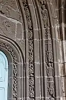 The carvings on the arch over the two entrance doors to the church
