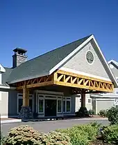A large timber Howe truss in a commercial building.