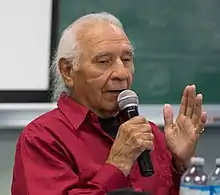 Loyie at a book launch at the Shingwauk Gathering in 2015