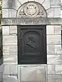 Bronze plaque of John Lathrop first president of the University