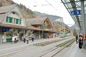 Three-story station building with gabled roof