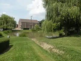 The village hall and lake