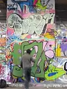 A graffiti artist at work in London