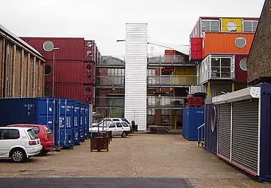 Container City I and Container City II with an upturned container containing a stairwell between them