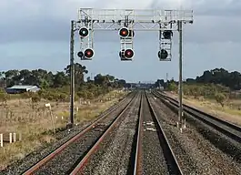 The twin broad gauge and single standard gauge tracks near Lara