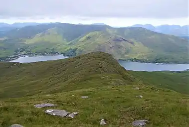 Massif of Leenaun Hill, with Leenaun village, from across Killary Harbour on Ben Gorm